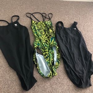 three one piece Nike and TYR swimsuits
